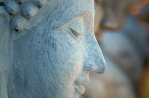 Buddha-Face-by-sakhorn38-at-freefotos-300x199